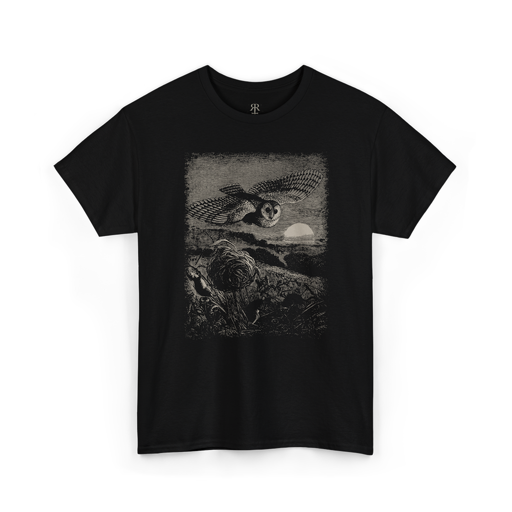 Black t-shirt with a graphic design of an owl  flying over a field