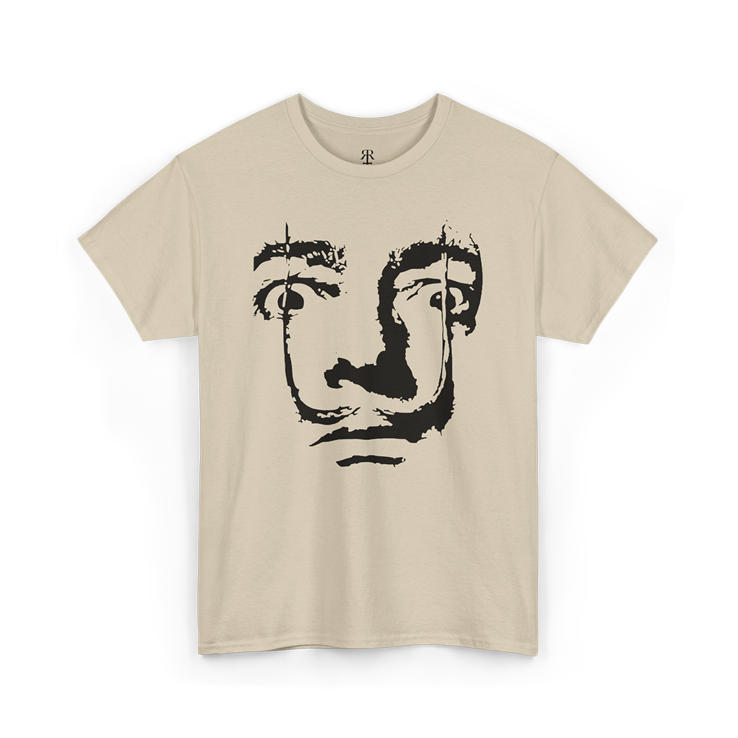 A beige T-shirt featuring a printed face of Salvador Dali