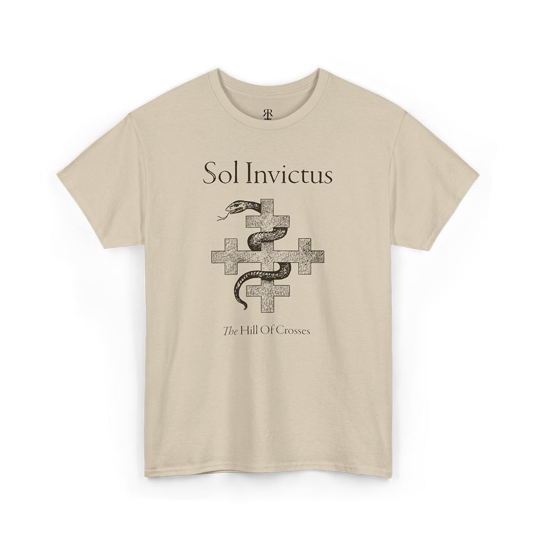 A beige t-shirt featuring a graphic print of a snake and crosses, and the text 'Sol Invictus The Hill of Crosses'.