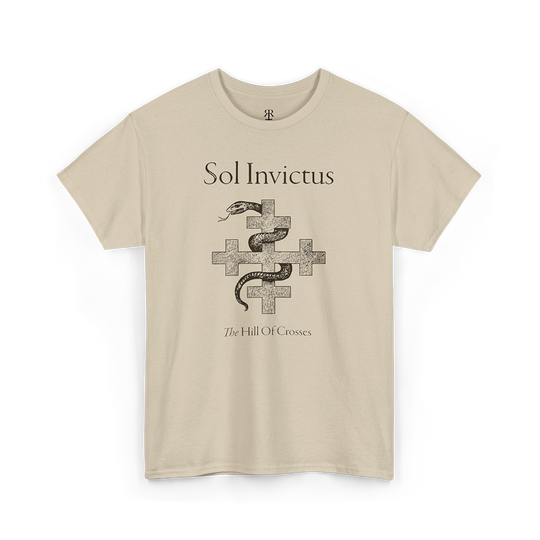 A beige t-shirt featuring a graphic print of a snake and crosses, and the text 'Sol Invictus The Hill of Crosses'.