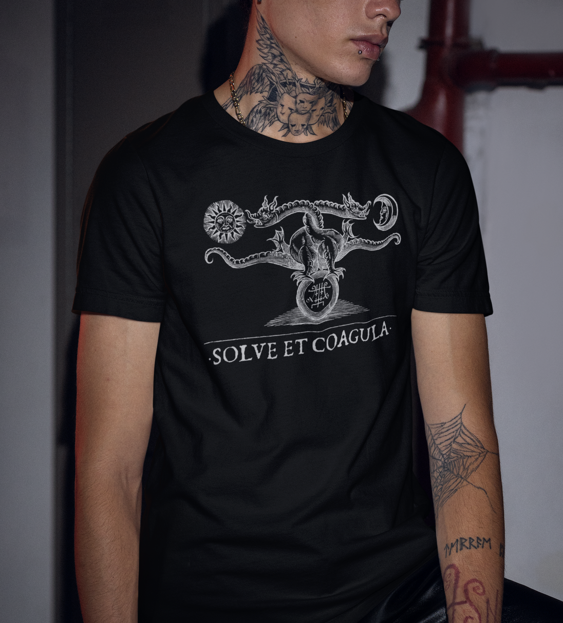 Man wearing Solve Et Coagula T-Shirt