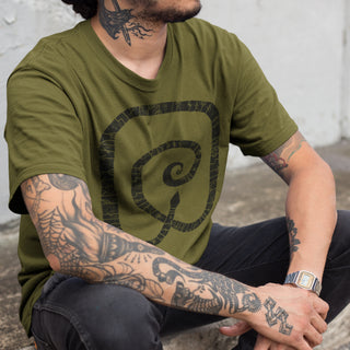 Tattoed man wearing olive green Gripsholm Stone T-Shirt