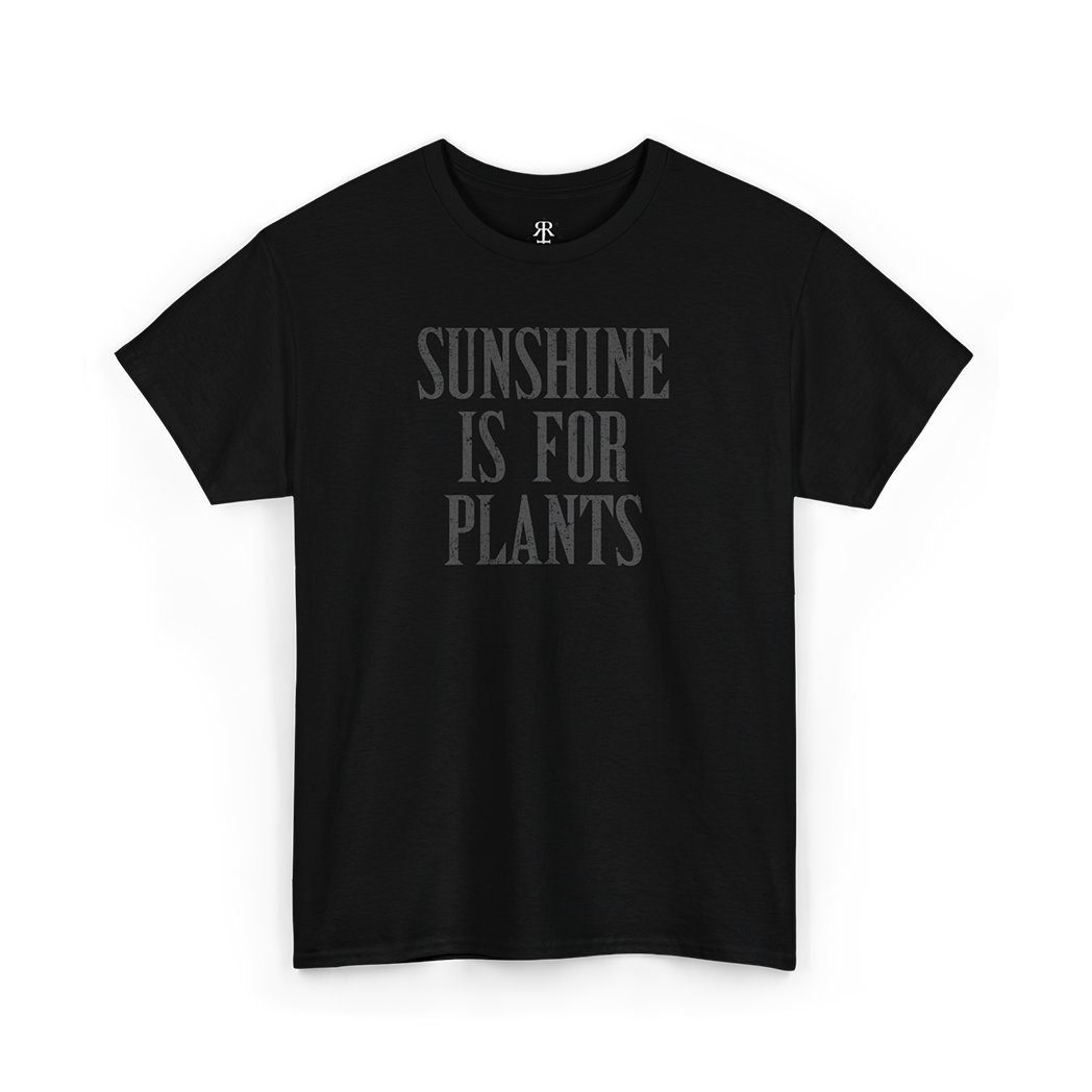 Black crew neck t-shirt with the text 'SUNSHINE IS FOR PLANTS' printed in gray on the front.