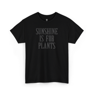 Black crew neck t-shirt with the text 'SUNSHINE IS FOR PLANTS' printed in gray on the front.