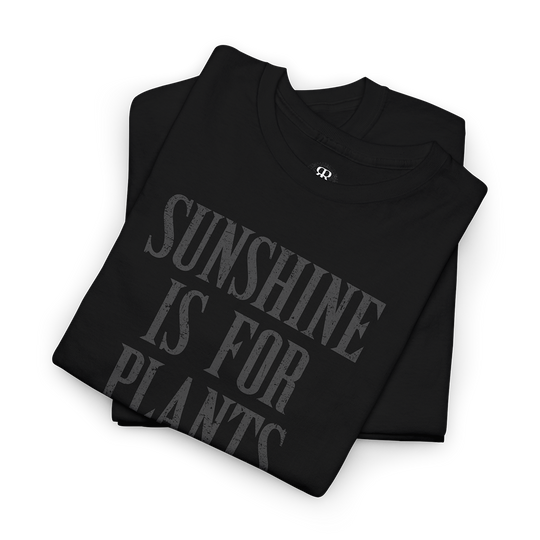 Black crew neck t-shirt with the text 'SUNSHINE IS FOR PLANTS' printed in gray on the front.