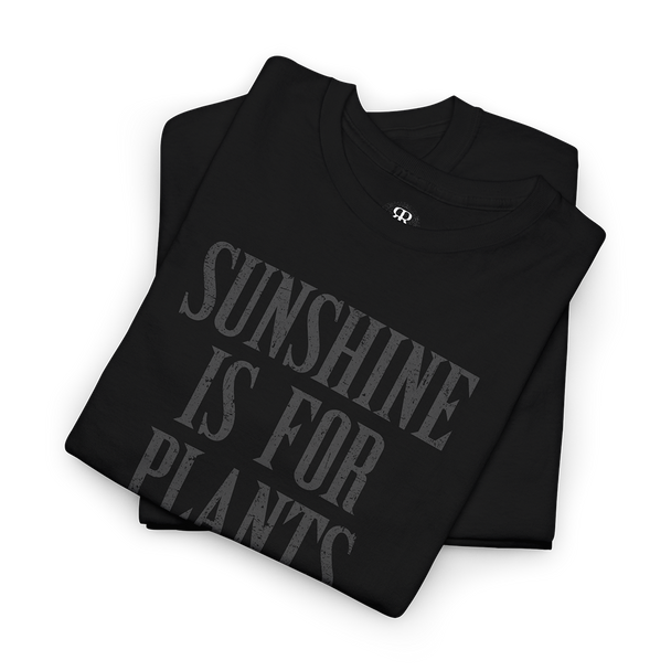 Black crew neck t-shirt with the text 'SUNSHINE IS FOR PLANTS' printed in gray on the front.