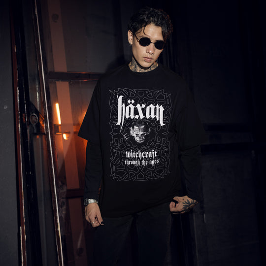 Man wearing Häxan: Witchcraft Through the Ages T-Shirt
