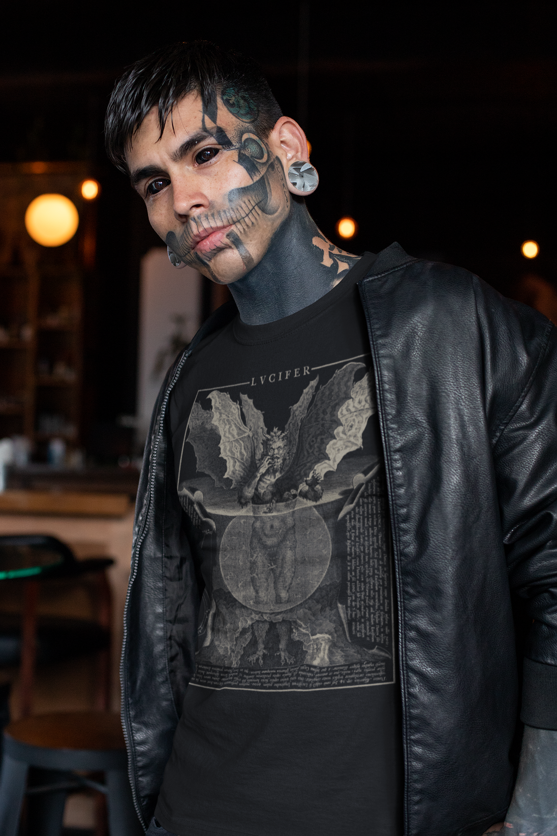 Tattoed man wearing Cornelis Galle Lucifer T-Shirt
