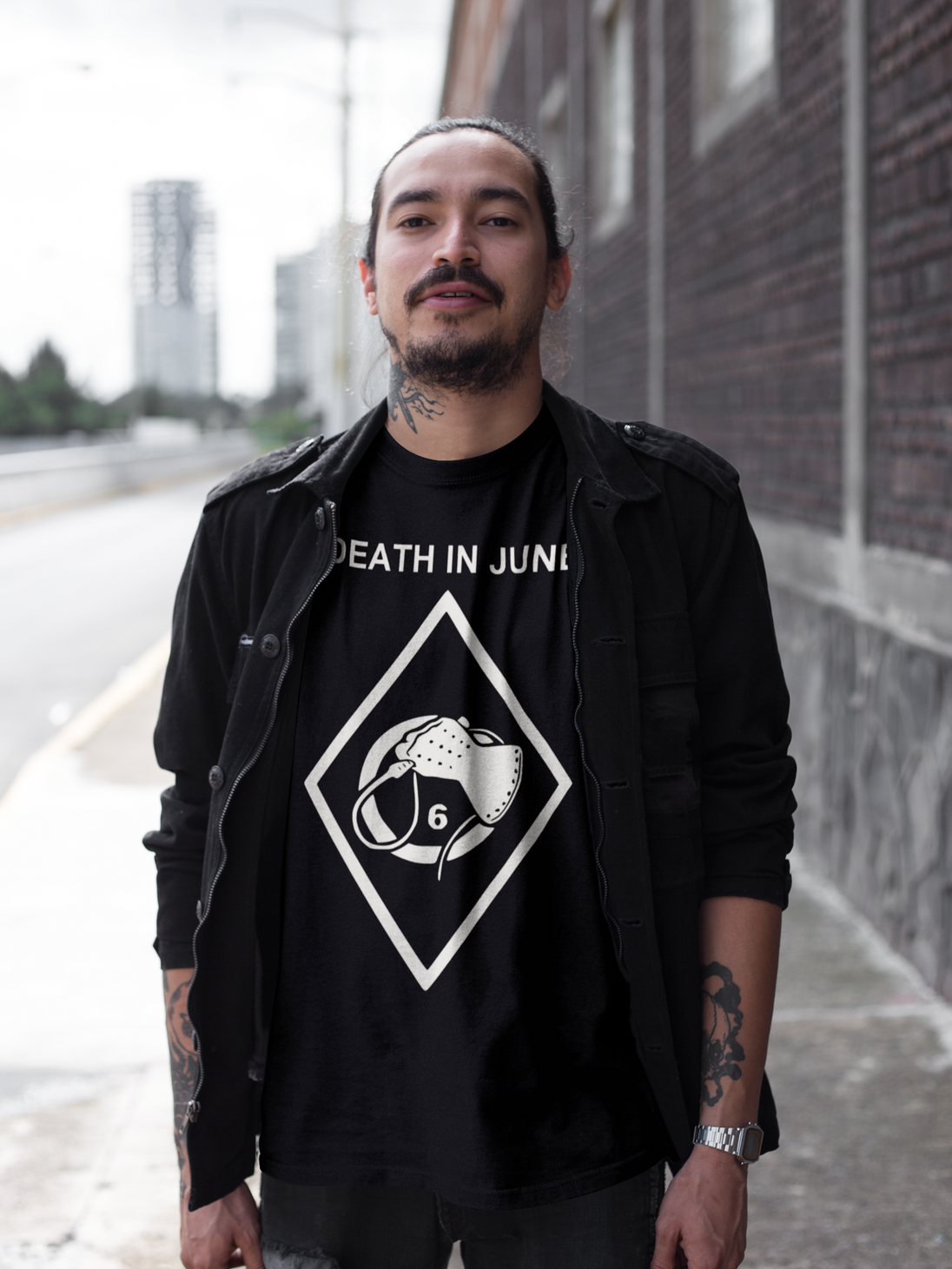 Tattoed man wearing Death in June hip Hand shirt