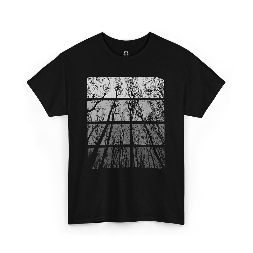 A black crew neck t-shirt with a graphic print of trees in a forest setting on the front.