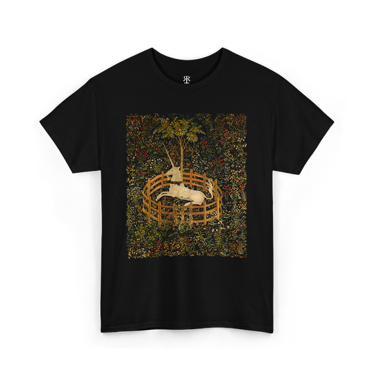 Black t-shirt featuring a central vintage illustration of a unicorn in a garden, surrounded by floral and fantastical elements reminiscent of medieval tapestries.