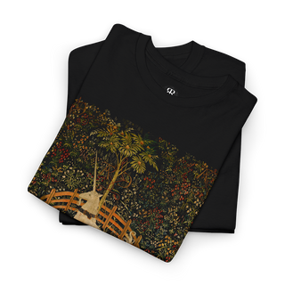 Black t-shirt featuring a central vintage illustration of a unicorn in a garden, surrounded by floral and fantastical elements reminiscent of medieval tapestries.