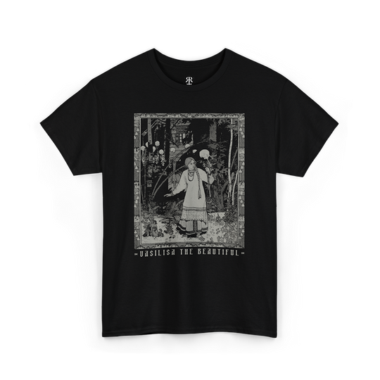 Black t-shirt with a graphic print of a character resembling Vasilisa the Beautiful from Russian folklore, standing in a woods setting with text that reads 'Vasilisa the Beautiful'.