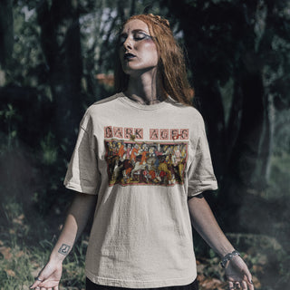 Person wearing a t-shirt with 'Dark Ages' graphic design in a forest setting