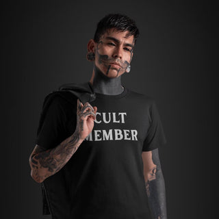 Tattoed man wearing Cult Member T-Shirt